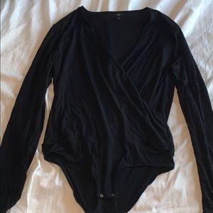 Black top, snap bottom body suit